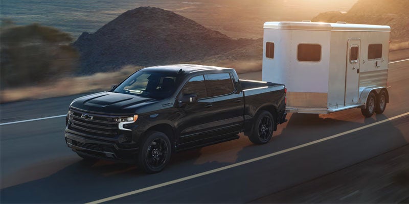 Chevrolet pickup truck with a trailer